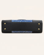 Black vegan leather base with protective feet on the Everlasting Union Motif tote bag