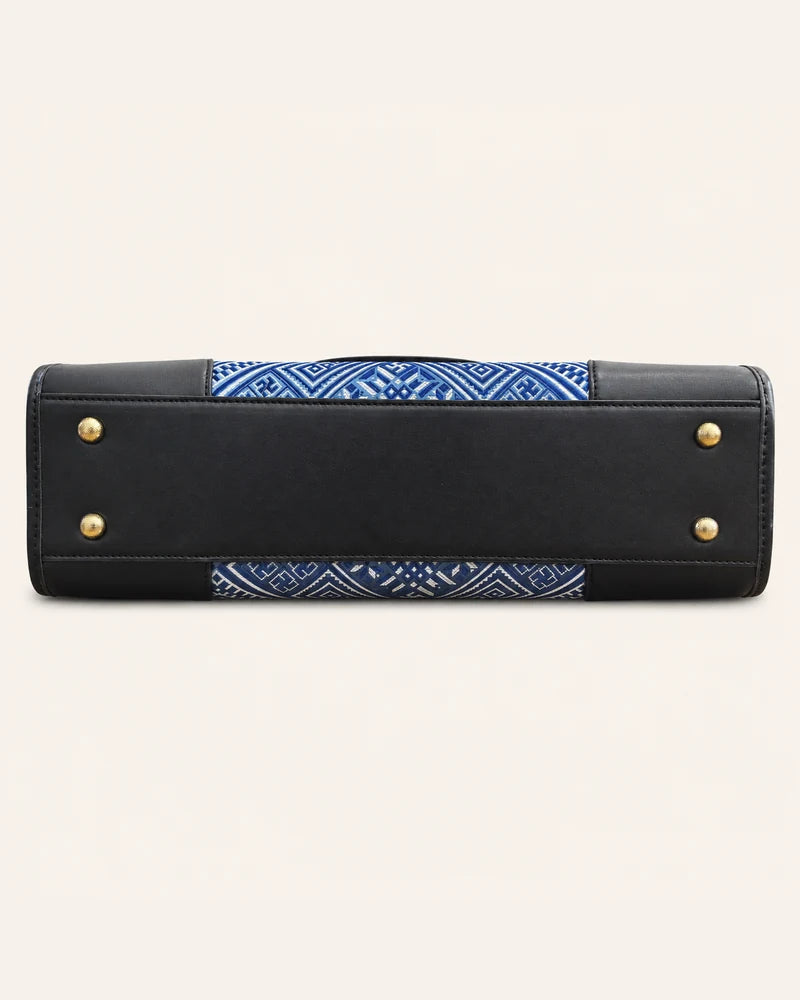 Black vegan leather base with protective feet on the Everlasting Union Motif tote bag