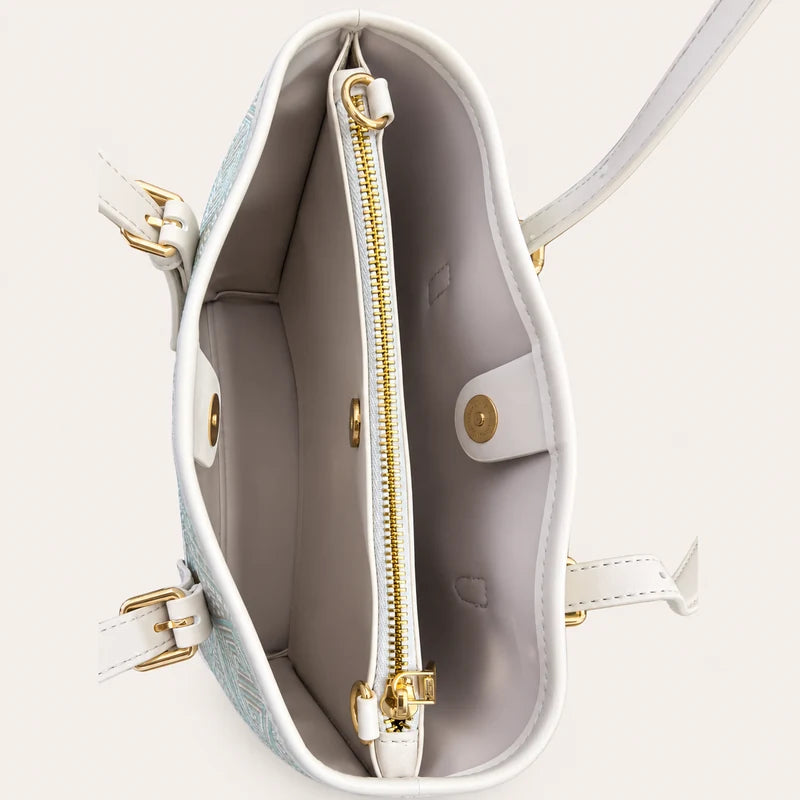 Lined interior compartments of the Longevity Motif Zhuang brocade tote bag