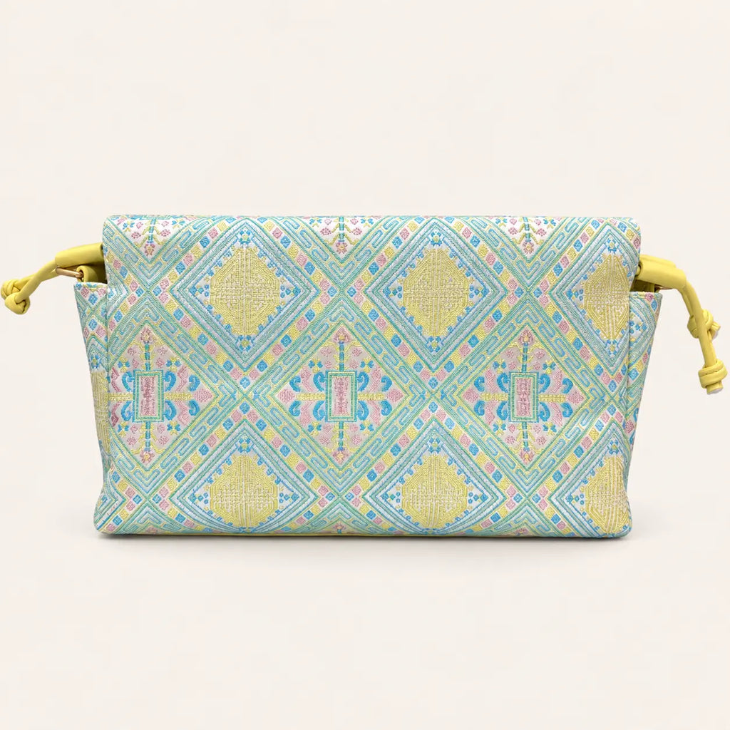 Longevity pattern woven crossbody bag back view