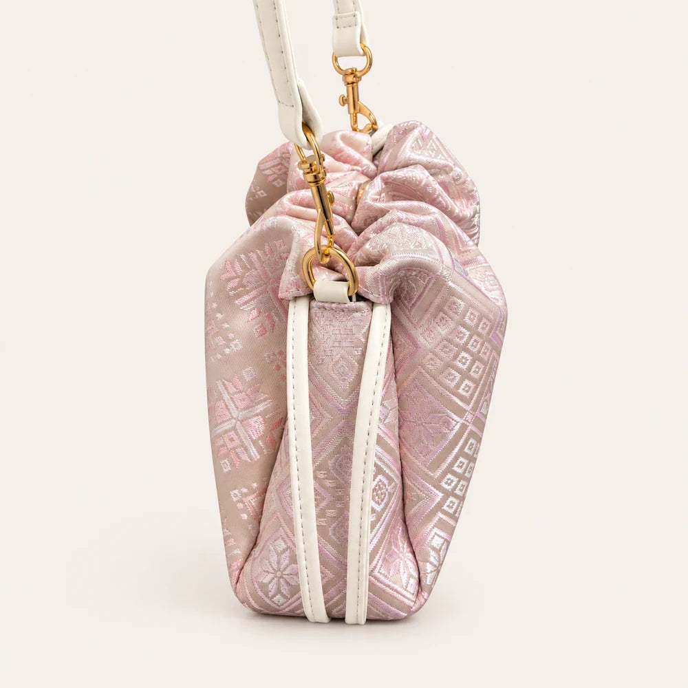 Zhuang brocade crossbody bag with Swallow-Blessed Farmland Motif, detail view
