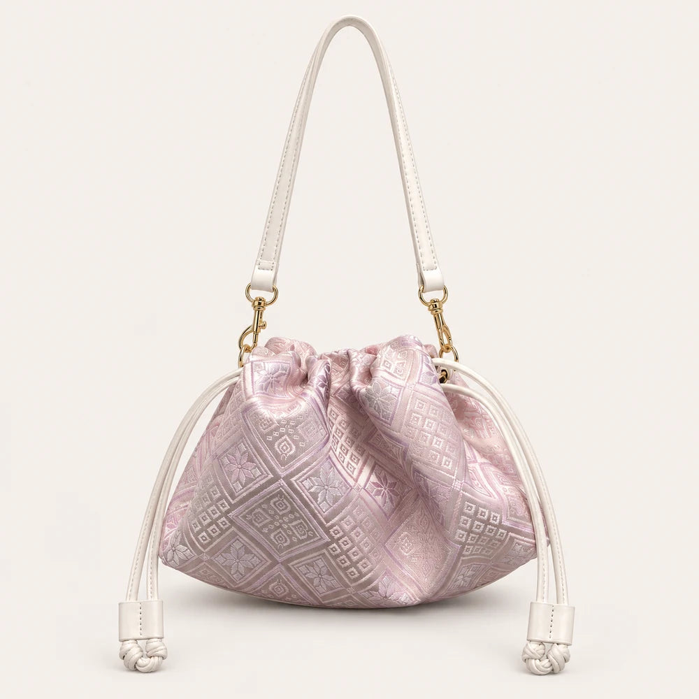 Zhuang brocade crossbody bag with Swallow-Blessed Farmland Motif, front view