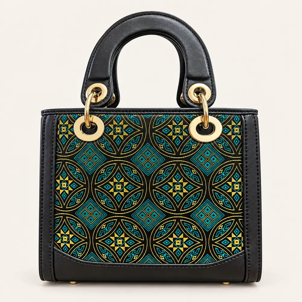 Zhuang brocade top-handle handbag with Wealth-Bringing Swallow Motif, front view
