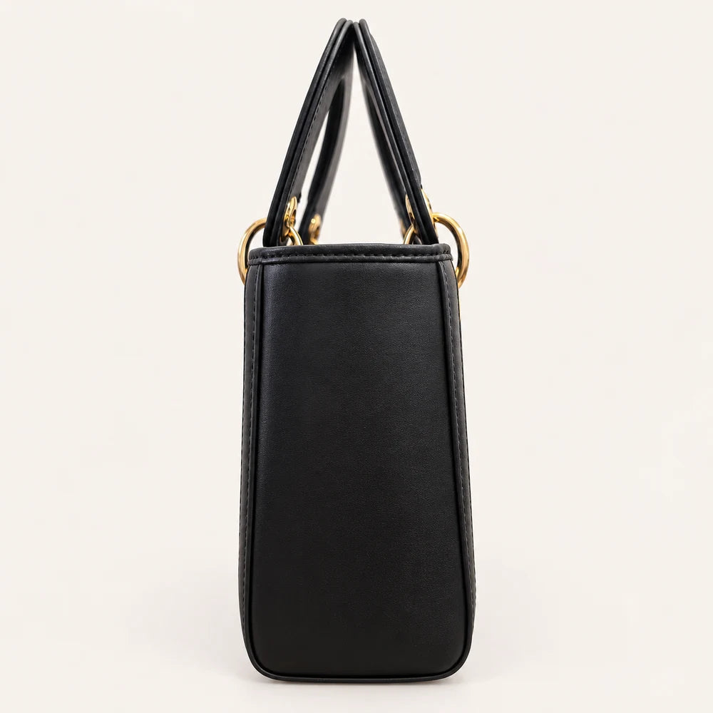 Gold-tone hardware detail on Wealth-Bringing Swallow Motif Zhuang brocade handbag